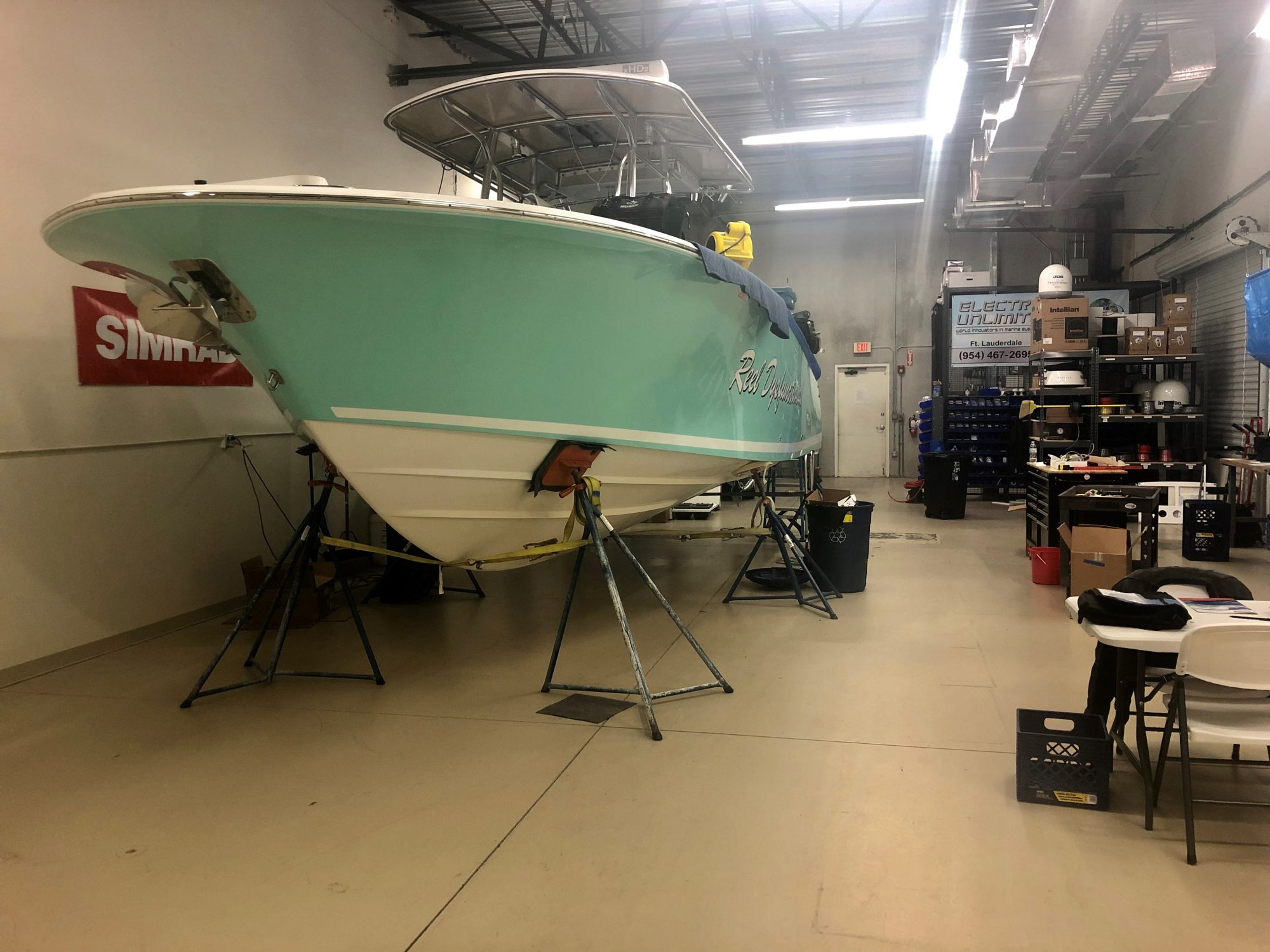 Southport center console boat in the Electronics Unlimited service bay