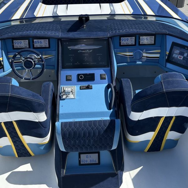 Performance boat helm with twin Raymarine multifunction displays