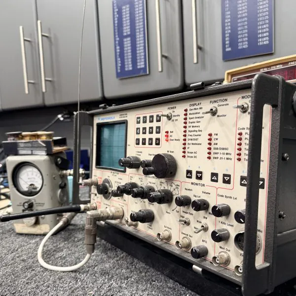 Oscilloscope and test equipment on the Electronics Unlimited service bench