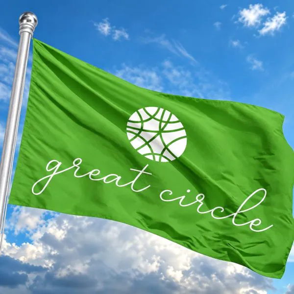 Great Circle Group flag flying against a blue sky